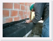 IMGP2601 * De bovenrand van de slab wordt omgeplooid en vastgelijmd op de polyester lat.