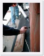 IMGP2651 * Tenslotte wordt de EPDM verlijmd met de binnenmuur.